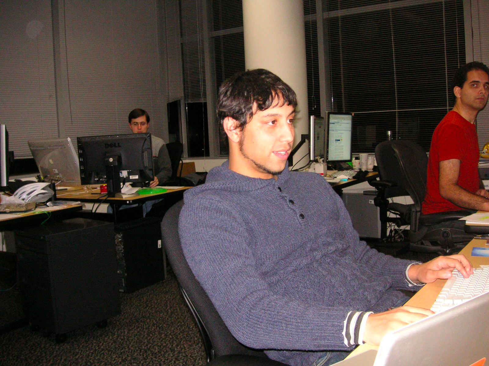 A photo of three men in an office, circa 2004.